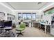 Well-lit home office with multiple workstations and great natural light at 18329 W Montebello Ave, Litchfield Park, AZ 85340