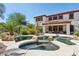 Beautiful backyard pool and spa with lush landscaping and desert plants at 18329 W Montebello Ave, Litchfield Park, AZ 85340