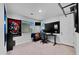 Gaming room with a view, light tile flooring, and room for activities at 18493 W Hiddenview Dr, Goodyear, AZ 85338