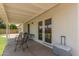 Covered patio with outdoor seating, ideal for enjoying the backyard and views of the lawn at 19 W Wickieup Ln, Phoenix, AZ 85027