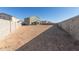 A large backyard offers endless possibilities for outdoor enjoyment and entertainment at 22962 N 182Nd Ln, Surprise, AZ 85387