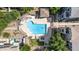 Aerial shot highlights a rectangular community pool, surrounded by shade structures and manicured landscaping at 2401 E Rio Salado Pkwy # 1192, Tempe, AZ 85288