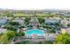 Aerial view of a planned community with a swimming pool, surrounded by green landscaping and houses at 2401 E Rio Salado Pkwy # 1192, Tempe, AZ 85288