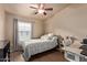 Cozy bedroom features wood floors, a ceiling fan, a full-sized bed, and a small desk at 2401 E Rio Salado Pkwy # 1192, Tempe, AZ 85288