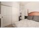 Neutral bedroom with an adjacent closet and doorway to the other parts of the house at 241 W Roadrunner Dr, Chandler, AZ 85286