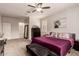 Tranquil bedroom showcases a plush bed, neutral tones, and ample natural light at 241 W Roadrunner Dr, Chandler, AZ 85286