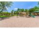 Community playground and play structure featuring slides and climbing bars for outdoor fun at 241 W Roadrunner Dr, Chandler, AZ 85286