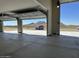 Spacious three-car garage with automatic doors and scenic mountain views, offering ample parking and storage at 2516 W Joy Ranch Rd, Phoenix, AZ 85086