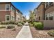 Community street view showcasing well-maintained landscaping and attractive exterior architecture at 2631 S Sulley Dr # 106, Gilbert, AZ 85295