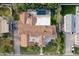 Aerial view of a luxury property showcasing a pool, patio area, and meticulously landscaped grounds at 2748 E Warbler Rd, Gilbert, AZ 85297