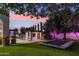Lush backyard featuring a pool, pergola, mature trees, and trampoline for outdoor fun and relaxation at 2748 E Warbler Rd, Gilbert, AZ 85297