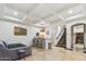 Spacious basement with bar, staircase, and porcelain tile floor at 2748 E Warbler Rd, Gilbert, AZ 85297