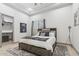 Bright bedroom featuring a comfortable bed, soft rug, and ample natural light from a window at 2748 E Warbler Rd, Gilbert, AZ 85297