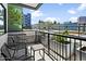 Private balcony with outdoor seating, offering great views of the pool at 3131 N Central Ave # 3009, Phoenix, AZ 85012