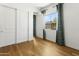 Bedroom with natural light, window, closet, and hardwood floors at 3131 N Central Ave # 3009, Phoenix, AZ 85012