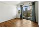 Bright bedroom featuring access to balcony with views of city at 3131 N Central Ave # 3009, Phoenix, AZ 85012