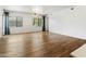 Bright open living space with hardwood floors, a large window with natural light, and sleek, modern finishes at 3131 N Central Ave # 3009, Phoenix, AZ 85012