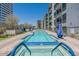 Inviting swimming pool area with blue-tiled spa perfect for relaxation and recreation at 3131 N Central Ave # 3009, Phoenix, AZ 85012