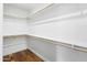 Walk-in closet with shelves and wood floors at 3131 N Central Ave # 3009, Phoenix, AZ 85012