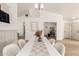 Dining area featuring modern decor, long table and seating for six people at 325 N Redrock St, Gilbert, AZ 85234