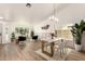 Open dining and living area with elegant decor, ample natural light, and modern furniture at 325 N Redrock St, Gilbert, AZ 85234
