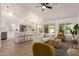 Bright living area with great flow to a kitchen and dining area creating an inviting, open space at 325 N Redrock St, Gilbert, AZ 85234