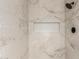Elegant marble shower featuring a built-in niche at 325 N Redrock St, Gilbert, AZ 85234