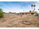 Spacious backyard with potential for landscaping and outdoor living, featuring desert landscape at 3410 W Pershing Ave, Phoenix, AZ 85029
