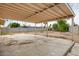Large covered patio in a spacious backyard, perfect for outdoor activities and relaxation at 3410 W Pershing Ave, Phoenix, AZ 85029