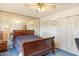 Comfortable bedroom with a queen-sized bed, mirrored wall and built-in closets at 3410 W Pershing Ave, Phoenix, AZ 85029