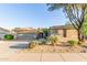 Charming single-story home with desert landscaping, a two-car garage and inviting curb appeal in a quiet neighborhood at 3523 W Buckhorn Trl, Phoenix, AZ 85083