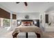Relaxing main bedroom with stylish decor, a comfortable king-size bed, and an attached bathroom with a soaking tub at 3523 W Buckhorn Trl, Phoenix, AZ 85083