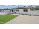Beautifully renovated single-story home with fresh exterior paint, a covered carport, and rock landscaping at 3609 E Palm Ln, Phoenix, AZ 85008