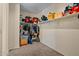 Spacious walk-in closet with shelving and rods for organizing clothes and accessories at 36412 W Pampoloma Ave, Maricopa, AZ 85138