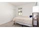 Minimalist bedroom with a twin bed and a sliding door closet at 39985 W Rio Lobo Dr, Maricopa, AZ 85138