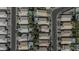 Experience an unparalleled aerial perspective showcasing a serene community, featuring neighborhood homes and vibrant pools at 4530 E Desert Wind Dr, Phoenix, AZ 85044
