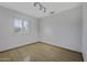 Bright bedroom featuring a window with natural light and recessed lights at 4530 E Desert Wind Dr, Phoenix, AZ 85044