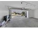 Spacious garage with an automatic door offers ample storage and access to the front yard at 4530 E Desert Wind Dr, Phoenix, AZ 85044