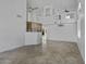 Spacious living room with tile flooring, high ceilings, and abundant natural light at 4530 E Desert Wind Dr, Phoenix, AZ 85044