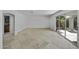Spacious living room with tile flooring and sliding glass doors leading to the backyard at 4530 E Desert Wind Dr, Phoenix, AZ 85044