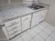 Modern kitchen featuring granite countertops, stainless steel appliances and white cabinets at 461 W Holmes Ave # 360, Mesa, AZ 85210
