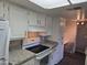 Bright kitchen features white cabinets, updated countertops, and modern appliances at 461 W Holmes Ave # 360, Mesa, AZ 85210