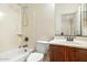 Bathroom features tub-shower combination and single vanity at 4716 E Red Oak Ln # 102, Gilbert, AZ 85297