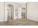 This bedroom has carpet and doorways leading to the bathroom and hallway at 4716 E Red Oak Ln # 102, Gilbert, AZ 85297