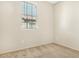 Bedroom featuring neutral walls, plush carpeting, and a window with blinds at 4716 E Red Oak Ln # 102, Gilbert, AZ 85297