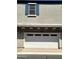 Attached garage with a white door and a window above, adding a finished look to the home's exterior at 4716 E Red Oak Ln # 102, Gilbert, AZ 85297