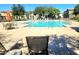 Resort-style community pool with ample seating, offering a luxurious leisure experience for residents at 4716 E Red Oak Ln # 102, Gilbert, AZ 85297