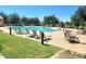 Inviting community pool with comfortable lounge chairs, ideal for relaxation and socializing at 4716 E Red Oak Ln # 102, Gilbert, AZ 85297