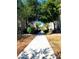 Scenic walkway lined with trees, enhancing the community's appeal with a serene and inviting pathway at 4716 E Red Oak Ln # 102, Gilbert, AZ 85297