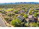 Desert community view of well maintained homes with private backyard pools at 4801 E Quien Sabe Way, Cave Creek, AZ 85331